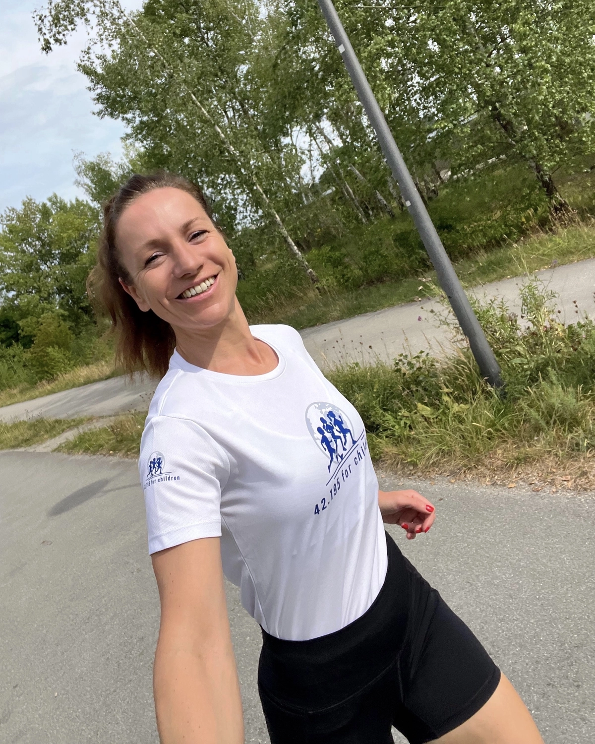42.195 for Children - a global running initiative - girl running